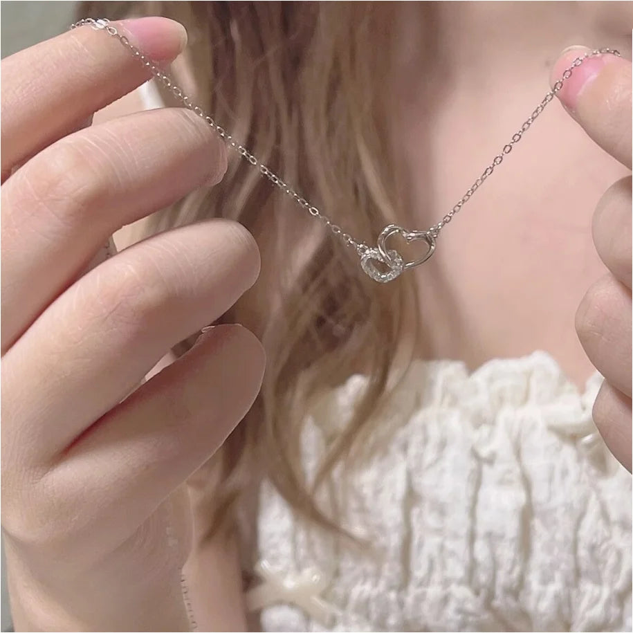 halskette zwei herzen aus silber mit zirkonia